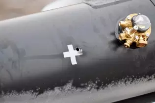 Przestrzelina w&nbsp;walcowym zbiorniku LPG