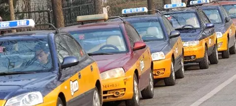 Pekin oczyszcza taksówki